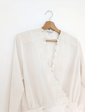 Load image into Gallery viewer, White Wrapover Bouse with Florals.
Size 12