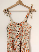 Load image into Gallery viewer, Cream button down dress with orange floral print. Size 10
