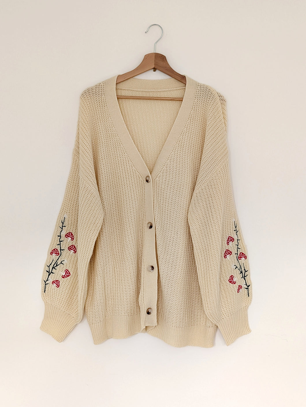 Cream Cardigan with Mushroom Sleeves. Size 24